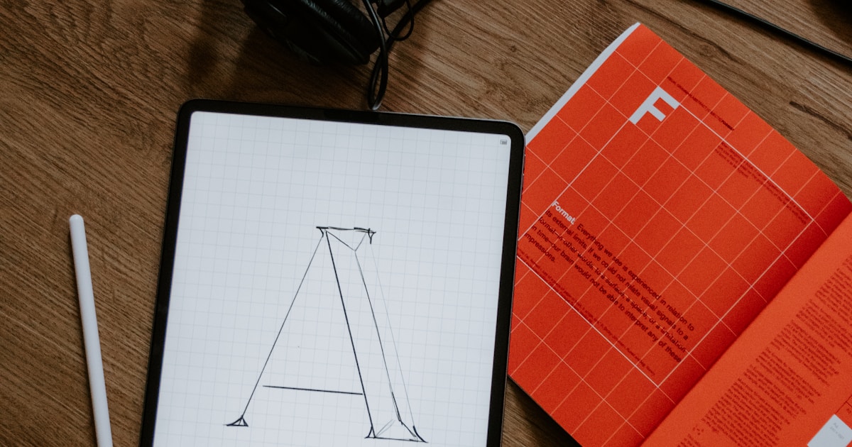 Professional optimizing LinkedIn profile on laptop to attract recruiters