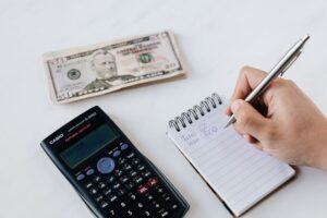 Professional resume writer reviewing documents - resume writing service cost 2026